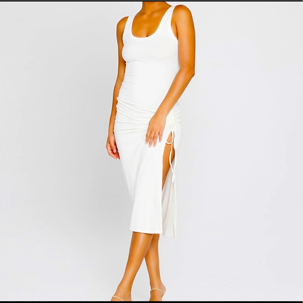 Cute white cover-up for the beach.